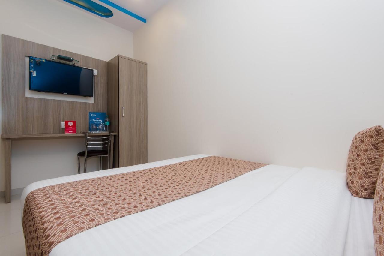 Oyo 14056 Golden Arch Hotel Mumbai Bagian luar foto