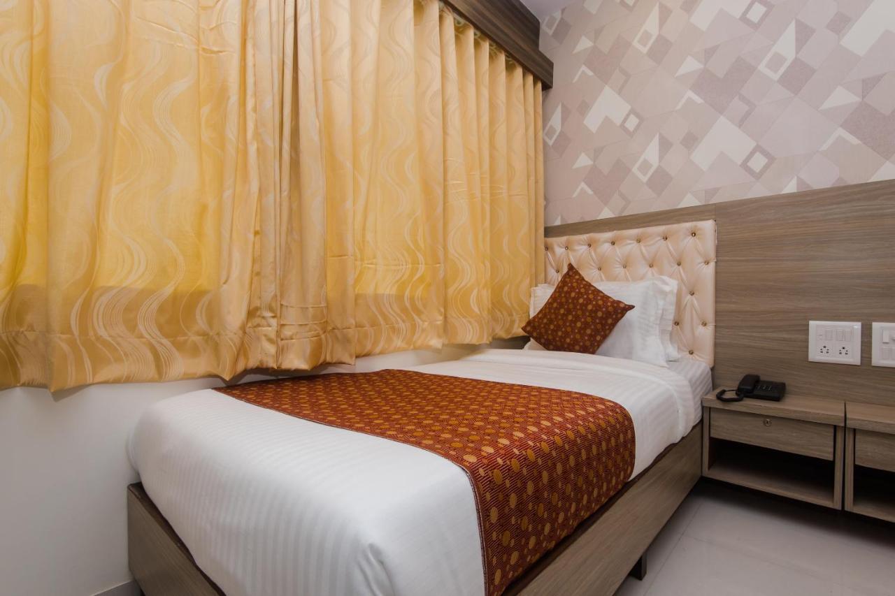 Oyo 14056 Golden Arch Hotel Mumbai Bagian luar foto