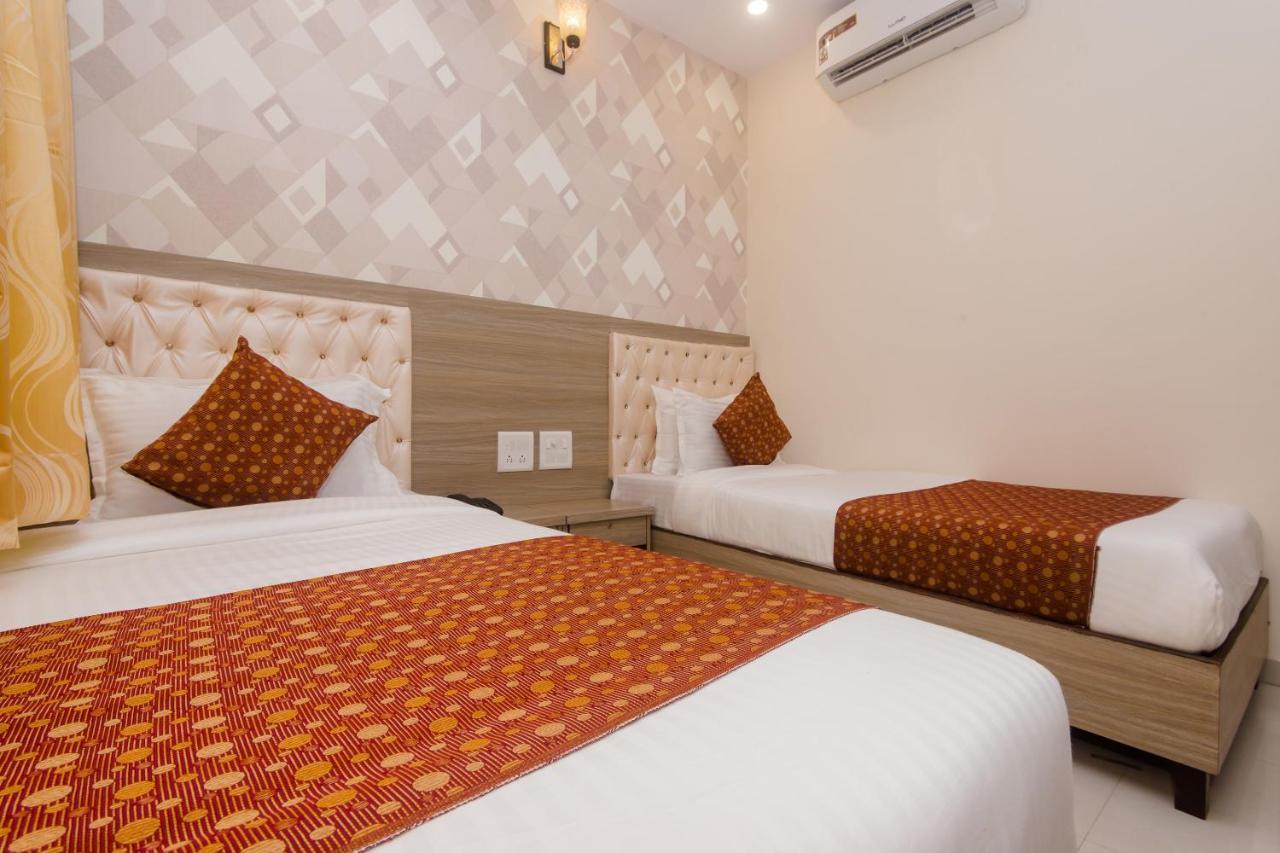 Oyo 14056 Golden Arch Hotel Mumbai Bagian luar foto