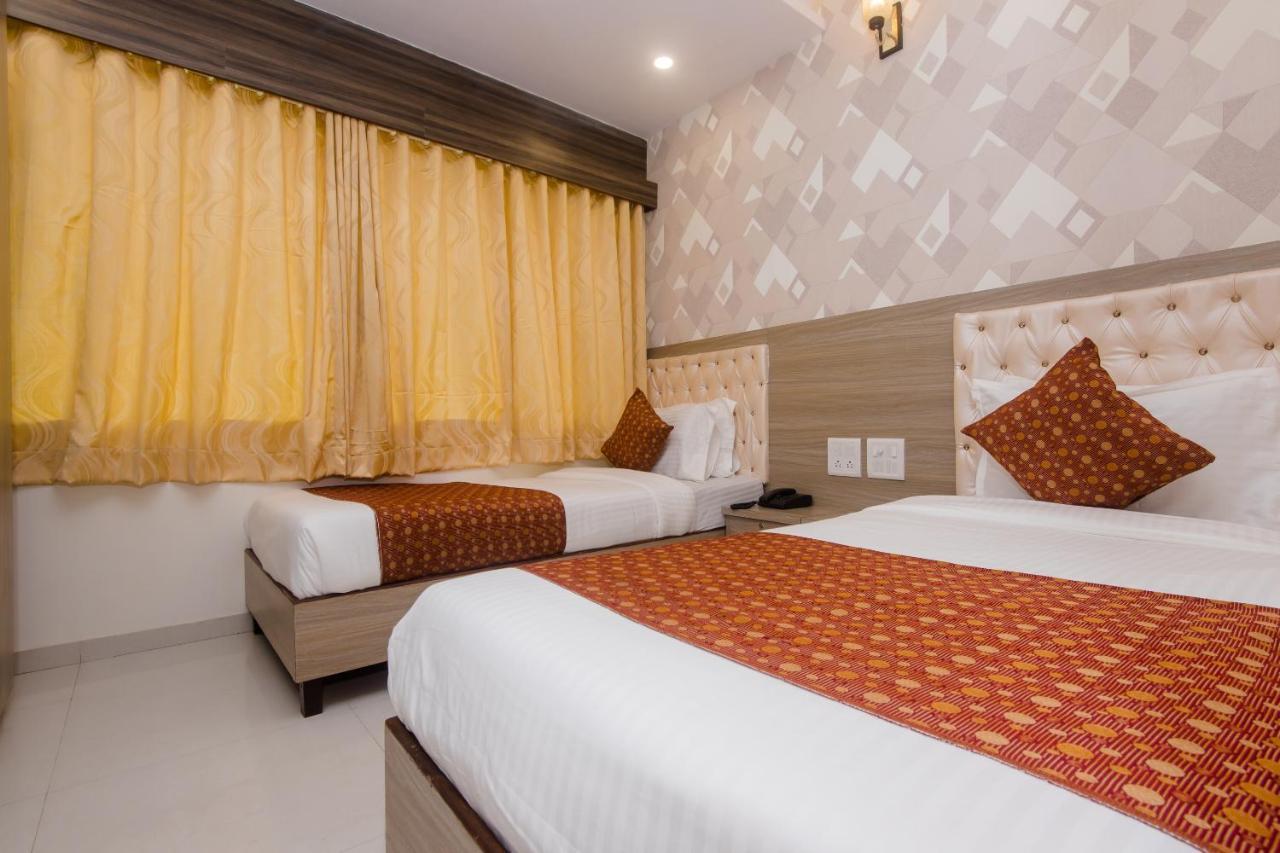 Oyo 14056 Golden Arch Hotel Mumbai Bagian luar foto