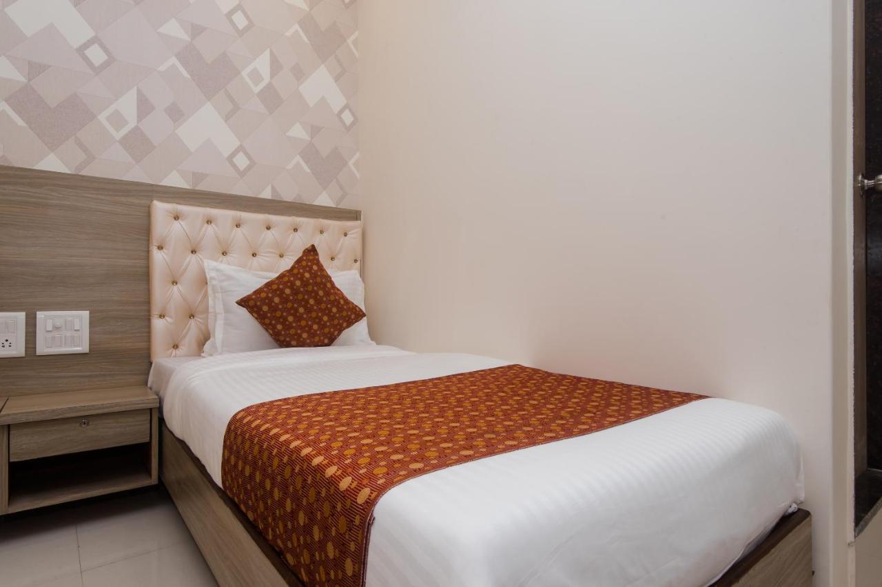 Oyo 14056 Golden Arch Hotel Mumbai Bagian luar foto